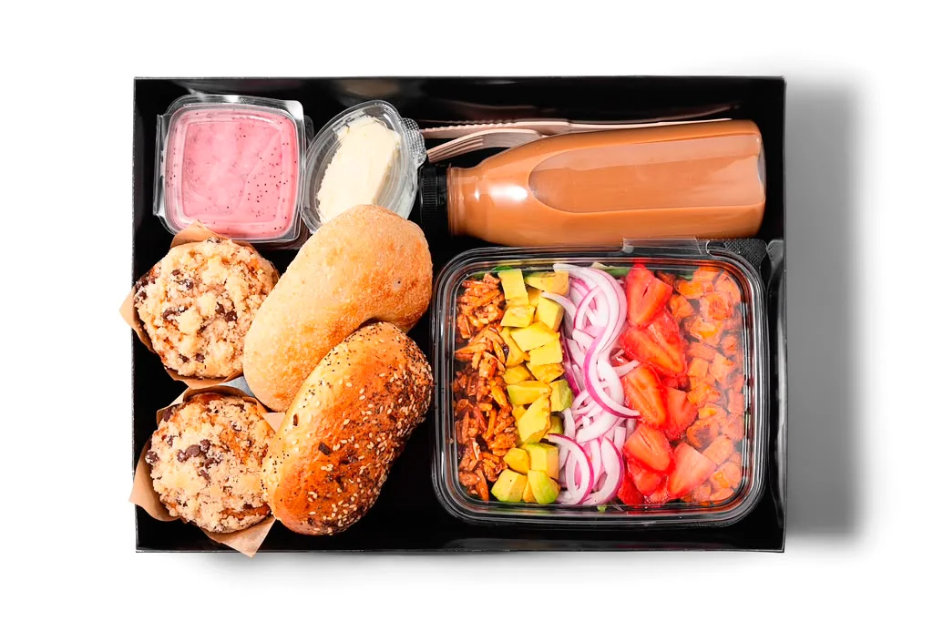Breakfast package for two with bagels, muffins, salad, spreads and a bottled drink